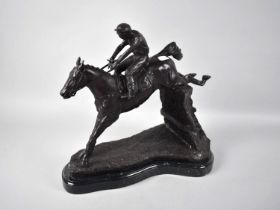 A Large Modern Patinated Bronze Study of Race Horse and Jockey Clearing Fence, Set on Shaped