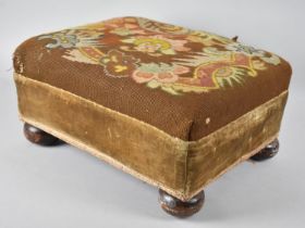 A Late 19th Century Tapestry Upholstered Rectangular Footstool on Bun Feet, 38cms by 32cms