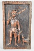 A Rectangular Carved Wooden Panel Depicting Huntsman Carrying Rifle with Game and Dog, 40cms by 23.