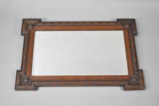 An Edwardian Oak Framed Rectangular Wall Mirror, 82x54cms