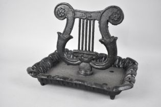 A Reproduction Victorian Style Black painted Cast Metal Lyre Shaped Boot Scraper, 31cms Wide plus