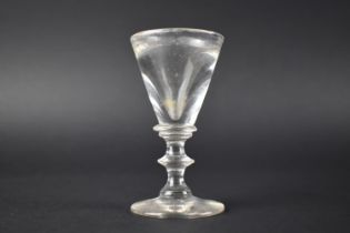 A 19th Century Illusion Toasting Glass with Conical Bowl, Knopped Stem and Circular Foot