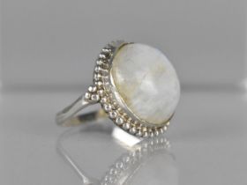 A Large Cabochon Moonstone Mounted Eastern Silver Ring, Centre Stone Measuring 16.7mm Diameter