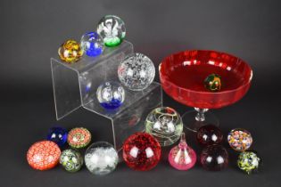 A Collection of Various Glass Paperweights Together with a Ruby Glass Pedestal Bowl