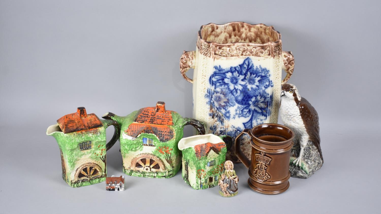 A Three Piece Cottage Tea Service, Transfer Printed Two Handled Vase with Elephant Handles,