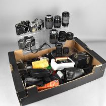 A Collection of Various Camera Bodies, Lenses and Other Camera Accessories to Include Zenit Camera