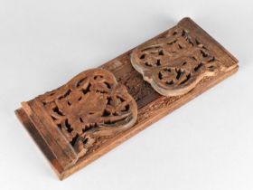 A Far Eastern Carved and Pierced Wooden Book Slide