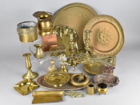 A Large Collection of Various Brassware to Comprise Chargers, Candlesticks, Trivet etc