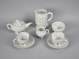 A Mid 20th Century German Pearlware Tea for Two Set comprising Teapot, Two Cups and Saucers,