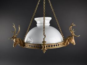 A Mid 20th Century Gilt Metal Ceiling Hanging Light Shade with three Stags Head Mounts, Unrelated