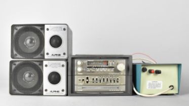 An Alpine Car Radio Cassette Player with Speakers