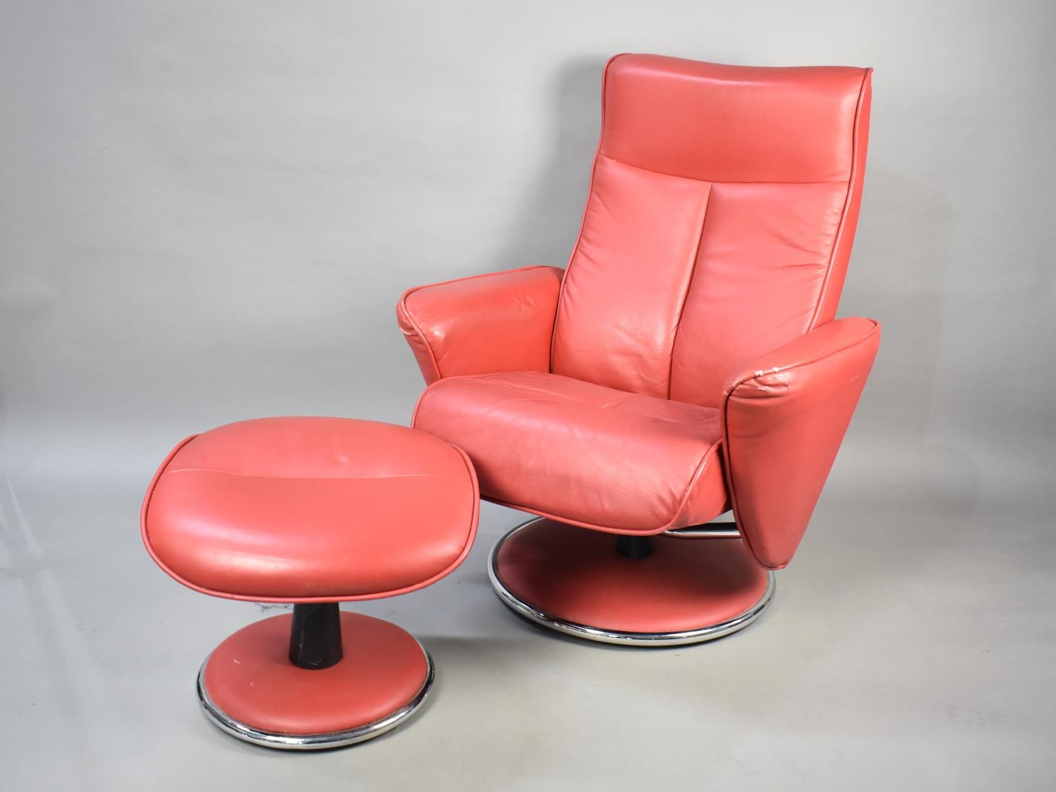A G-Plan Red Leather Reclining Easy Lounge Swivel Armchair with Matching Footrest
