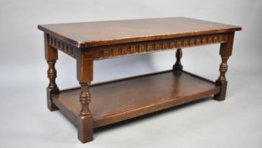 An Oak Rectangular Coffee Table with Stretcher Shelf, 101cms Wide