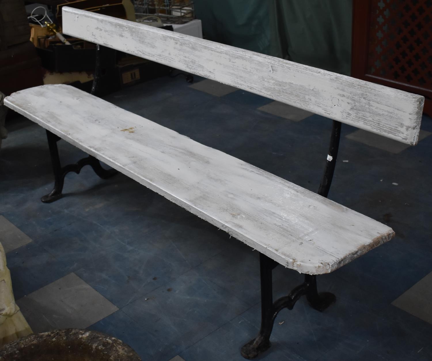 A Wooden And Cast Iron Bench with Plank Seat and Back, 184cms Wide