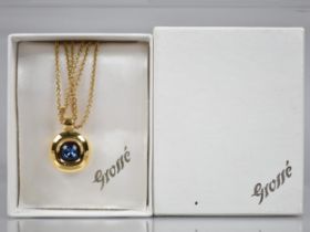 A Vintage Boxed Grosse (Affiliated with Christian Dior) Gilt Metal Jewelled Pendant Suspended on