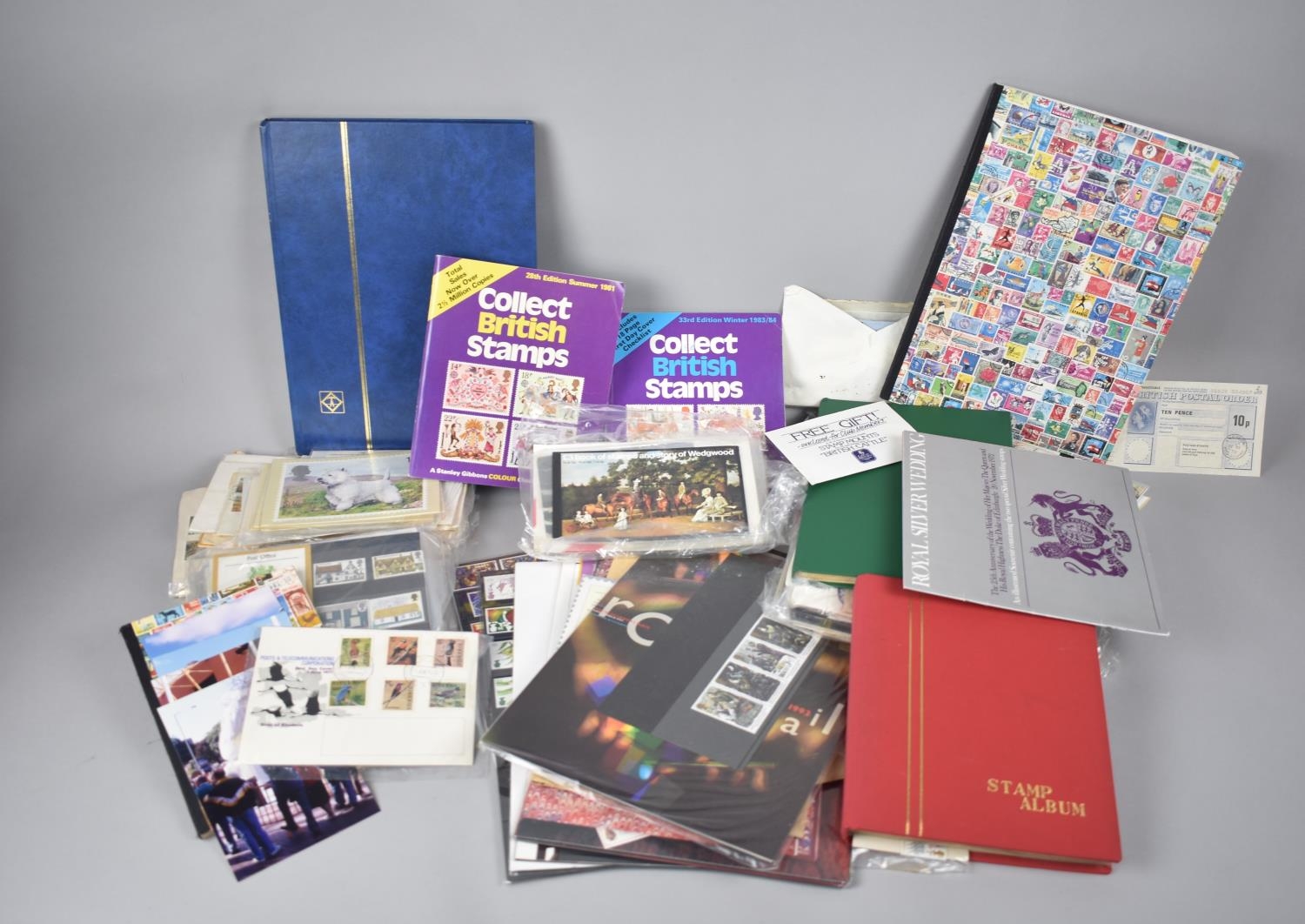 A Collection of Various World Stamps, Stamp Albums Etc