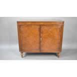 A 1970s Burr Wood Veneered Cabinet with Panelled Doors and Canted Edges, 91cms Wide