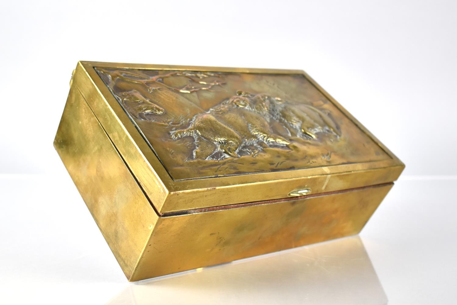 A Continental Brass Box, The Hinged Lid Decorated in Relief with Two Wild Boar Fighting, 21.5x13x7.