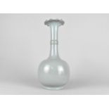 A Chinese Monochrome Bottle Vase with Flared Wavy Rim, Nine Character Mark to Base, 31cms High