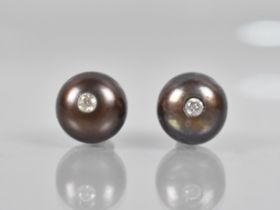 A Pair of Chocolate Pearl Earrings Mounted to Centre with Single Round Cut Diamond Measuring