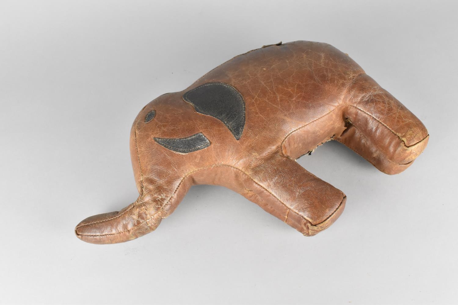 A Small Vintage Brown Stitched Leather Covered Footstool in the Form of an Elephant, in the Manner - Image 2 of 2
