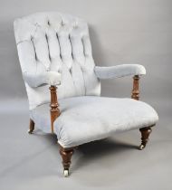 A 19th Century Button Backed Armchair the Manner of Howard & Sons on Castor Supports