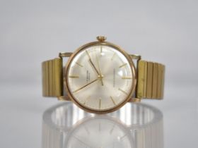 A 9ct Gold Benson Gents Wrist Watch, Satin Champagne Dial with Gold Baton Hands and Baton Hour
