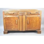 A Mid 20th Century Oak Sideboard with Base Cupboards Surmounted by Two Short Drawers, 134x45x87cms