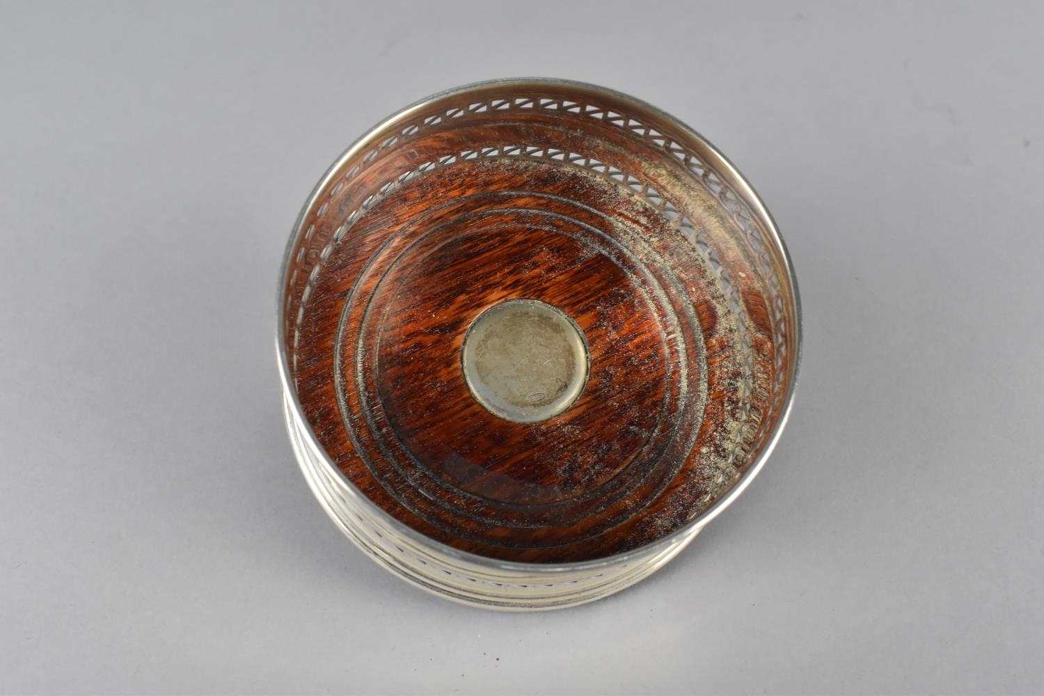 A Silver Bottle Coaster with Pierced Trim and Turned Wooden Base with Silver Mount, 9cm diameter - Image 3 of 3