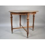 An Oak Circular Table on Turned Supports with X Frame Stretcher, 94cms Diameter Top