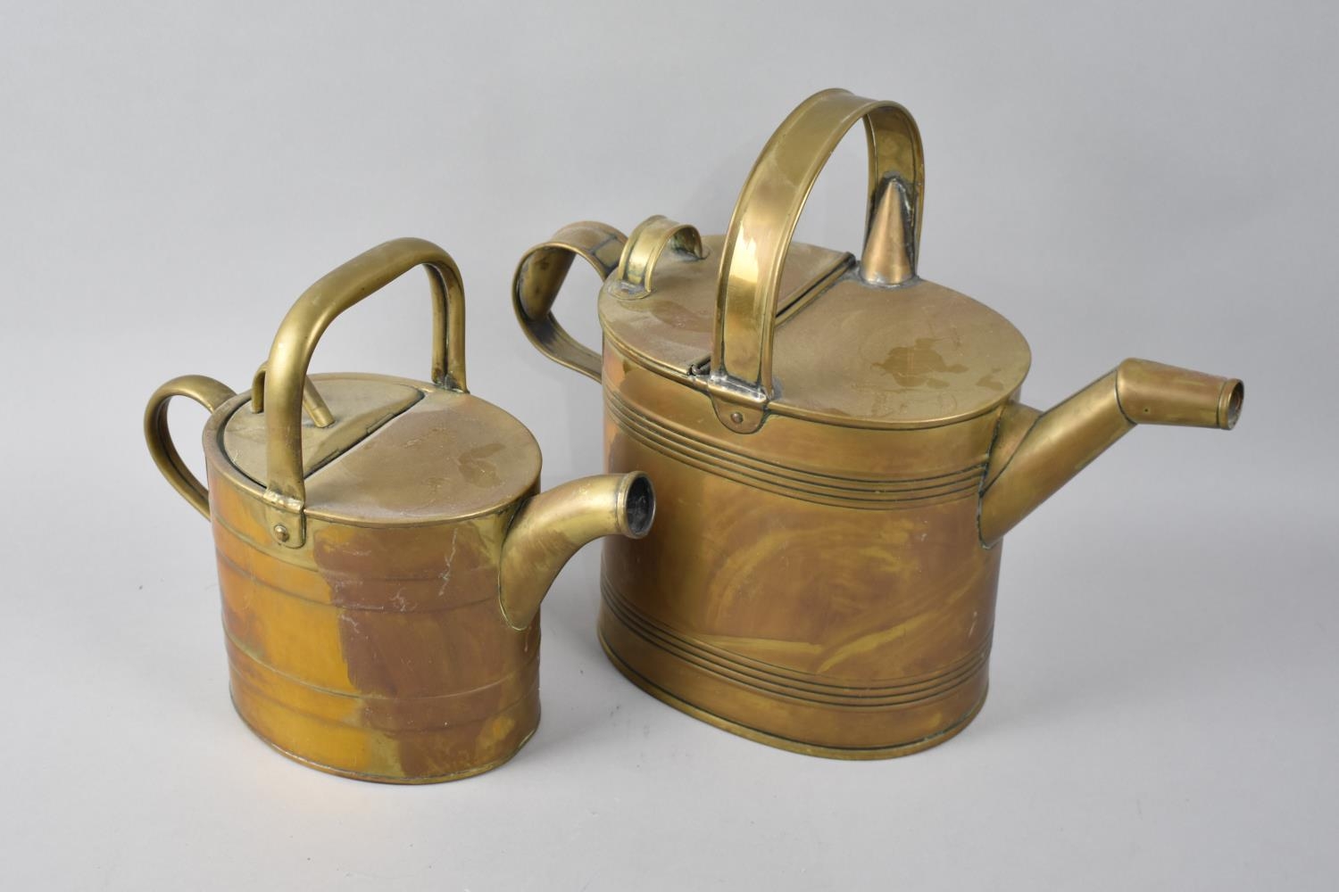 Two Late 19th/Early 20th Century Brass Watering Cans, Tallest with Makers Mark for J Hookham and