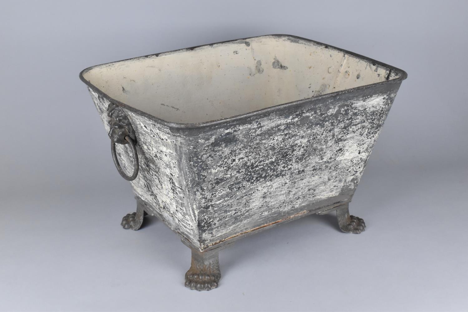 A Metal Footbath/Planter of Tapering Rectangular Form Raised on Cast Paw Feet, 44x34x27cms High