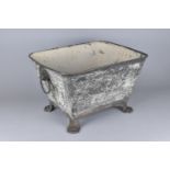 A Metal Footbath/Planter of Tapering Rectangular Form Raised on Cast Paw Feet, 44x34x27cms High