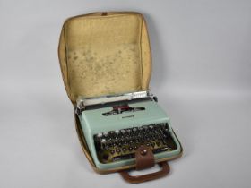 A Mid 20th Century Lettera 22 Typewriter in Case