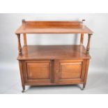 A 19th Century Mahogany Buffet with Cupboard Base Raised on Short Turned Feet Culminating In