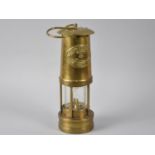 A Brass Miners Lamp by E.Thomas and Williams Ltd, Aberdare, Wales, No 55888, 24cms High