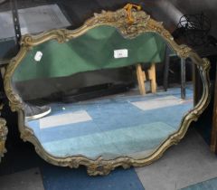 An Ornate Framed Mirror with Moulded Scrolls and Foliage Decoration