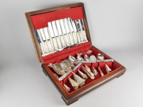 A Mahogany Canteen of Kings Pattern Cutlery by George Butler and Co