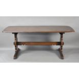 An Ercol Refectory Dining Table, 180cms Wide