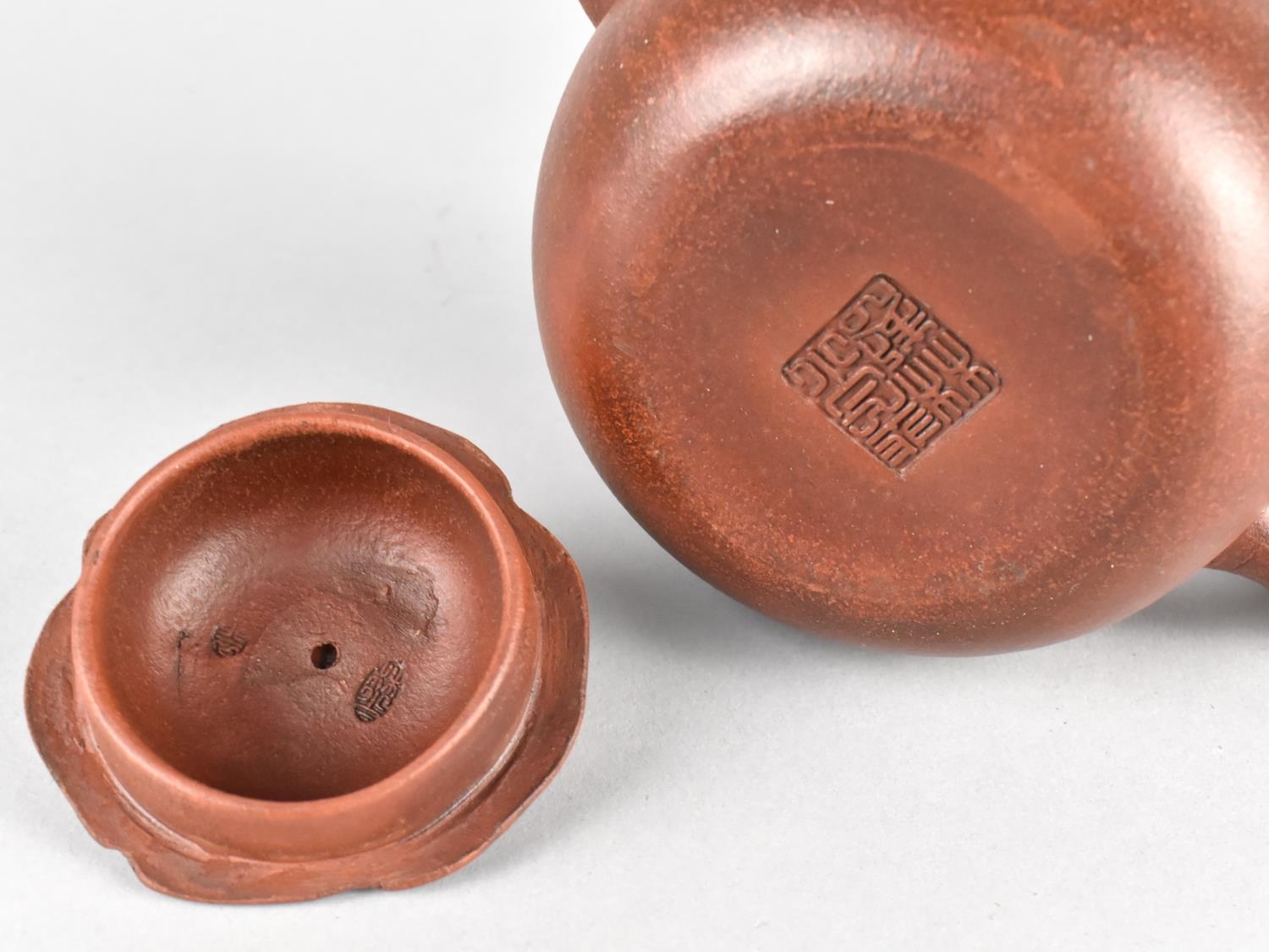 A Chinese Yixing Teapot, Stylised Spout and Handle with Incised Inscription and Sealmark to Base, - Image 3 of 3