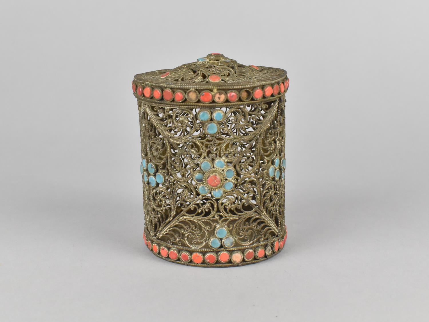 A Late 19th Century White Metal Cylindrical Filigree Box with Turquoise and Coral Cabochons, 9cms