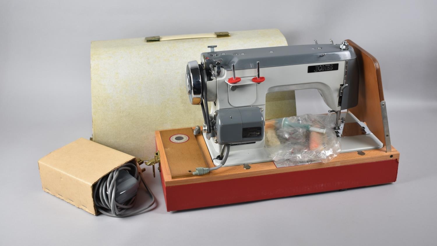 A Jones Model 568 Electric Sewing Machine Complete with Cable and Foot Pedal, Original Cardboard Box