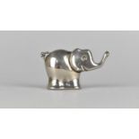 A c.1960s Advertising Pharmaceutical Paperweight Modelled as an Elephant for Proctosedyl, 18x5cms