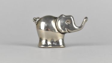 A c.1960s Advertising Pharmaceutical Paperweight Modelled as an Elephant for Proctosedyl, 18x5cms