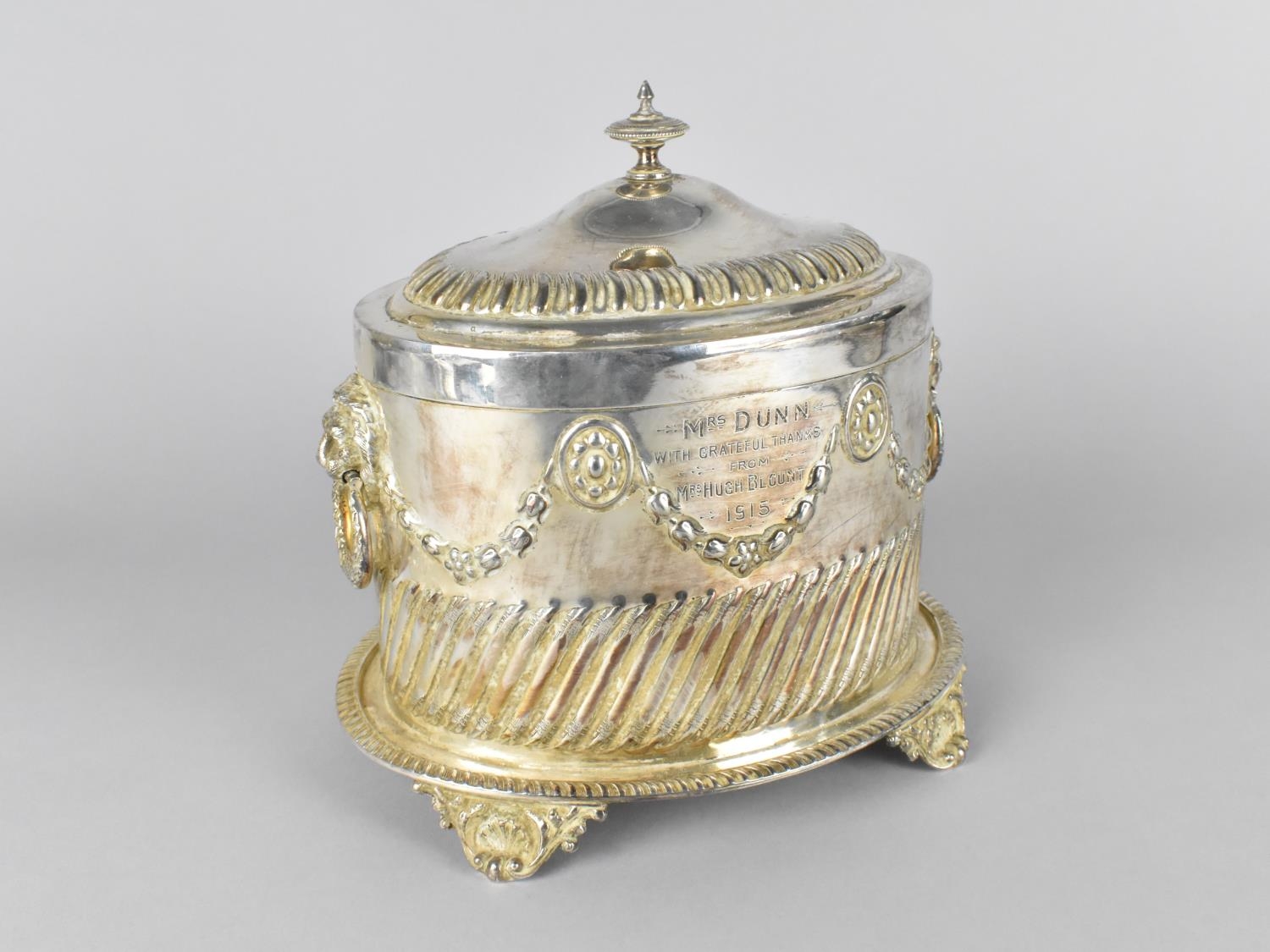 An Early 20th Century Silver Plated Presentation Biscuit Barrel of Oval Form, the Body with Lion
