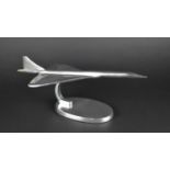 A Polished Aluminium Model of Concorde, 15cms High (plus VAT)