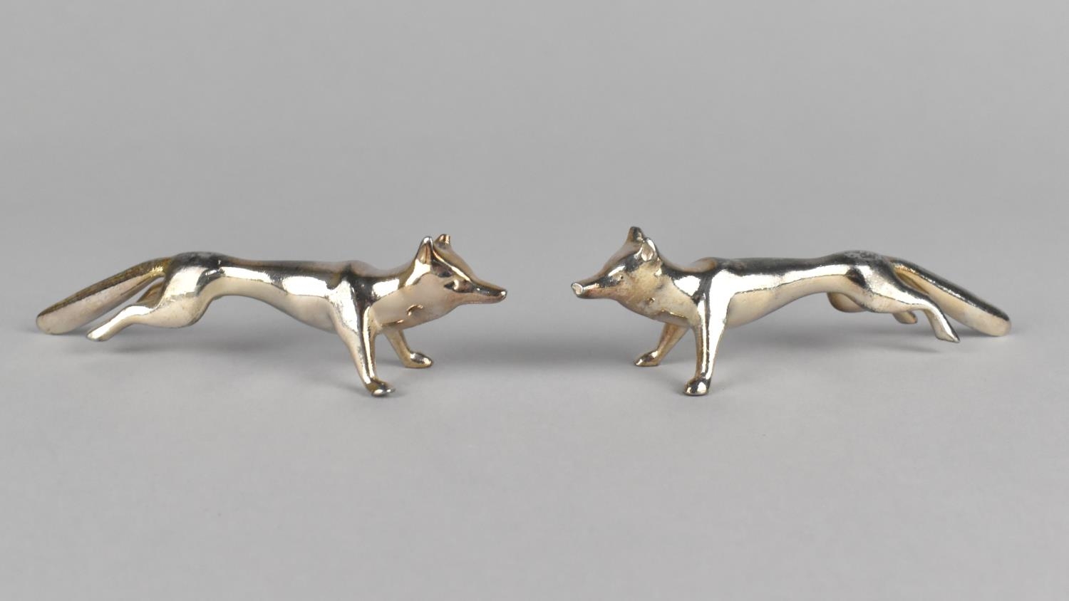 A Pair of Silver Plated Knife Rests Modelled as Foxes, 10cms Long