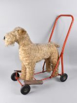 A Vintage Lines Bros of Ireland Push Along Terrier Dog with Steel Frame and Rubber Tyres, Makers