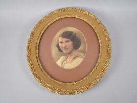 An Ornate Gilt Framed Photograph of a Lady, Frame 34x39cms