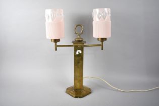 A Brass Two Branch Table Lamp with Pink Glass Cylindrical Shade, 47cms High